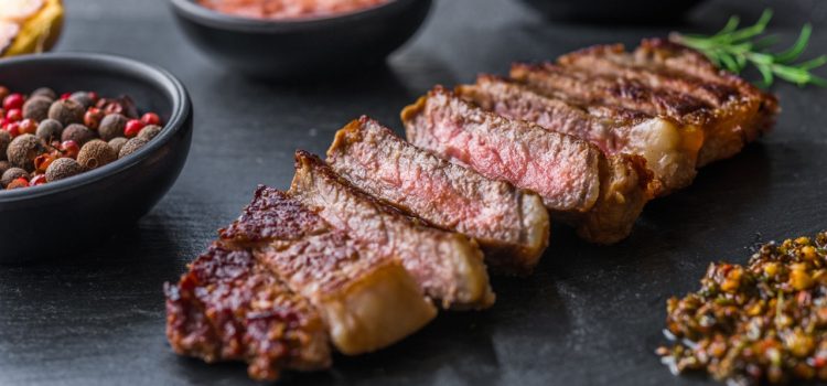 wagyu steak cut up on slate